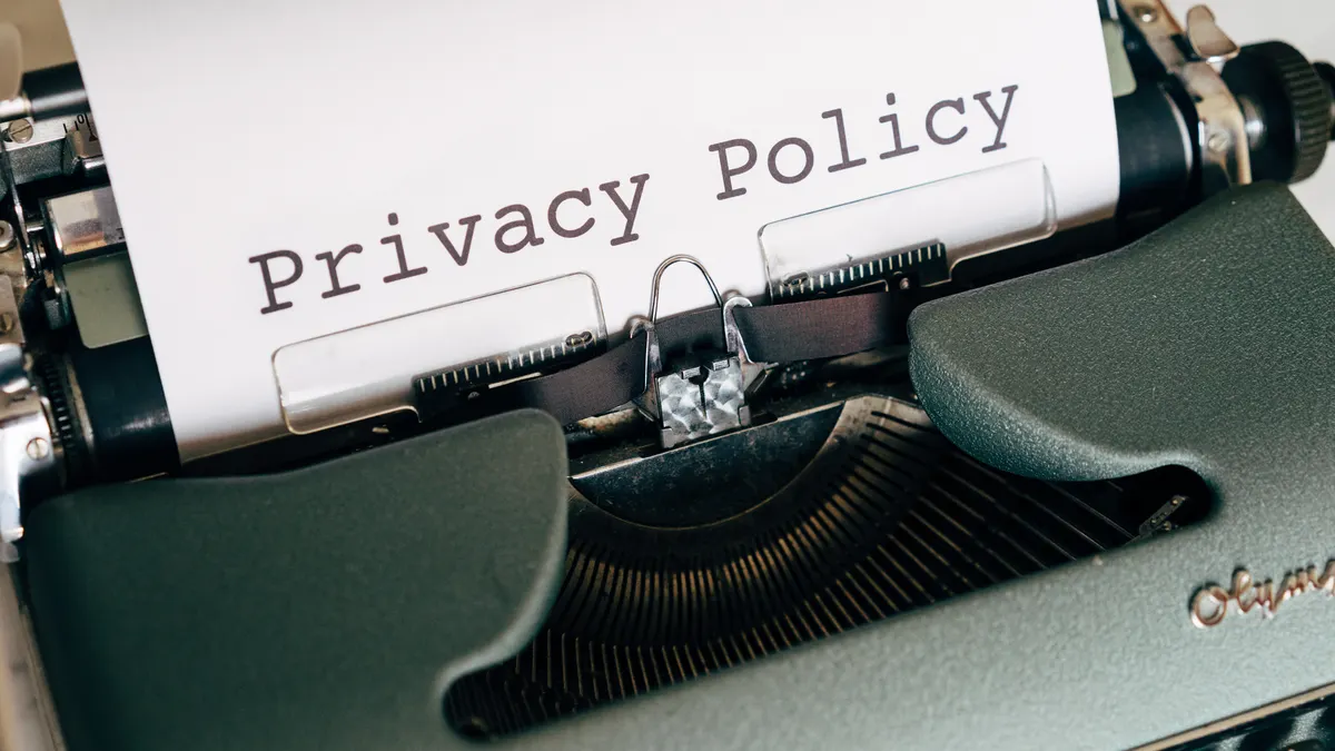 typewriter with privacy policy text